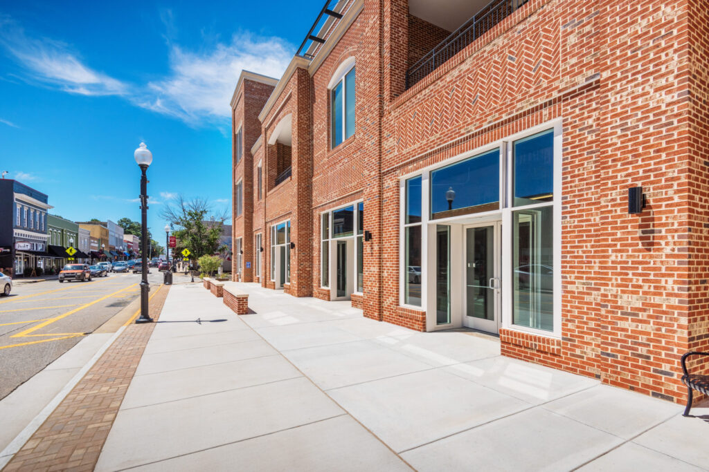 Sidewalk Next to Brick Building