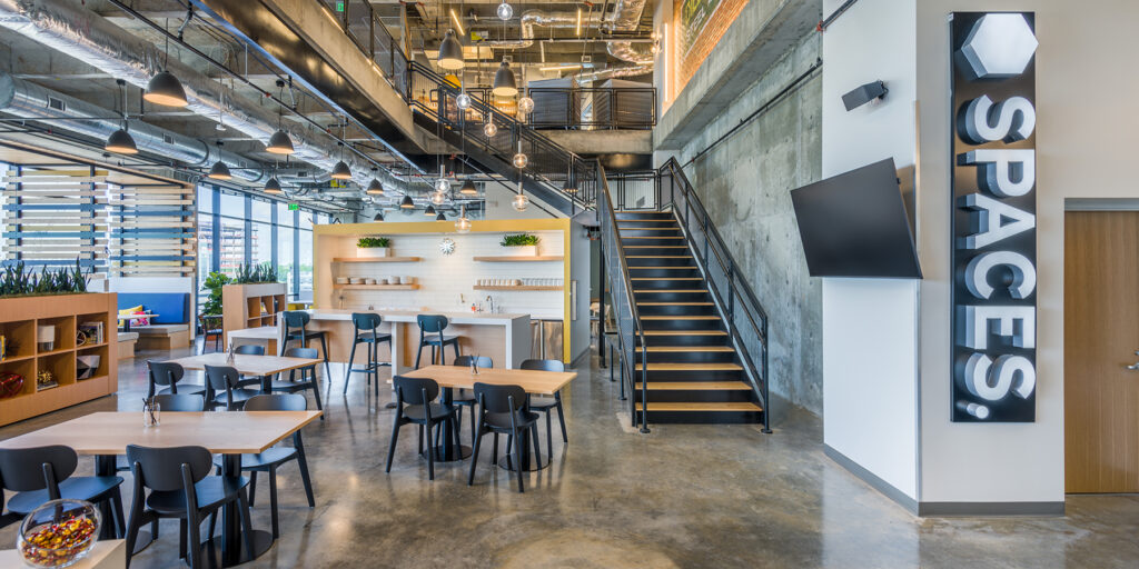 Area with stairs and tables and chairs