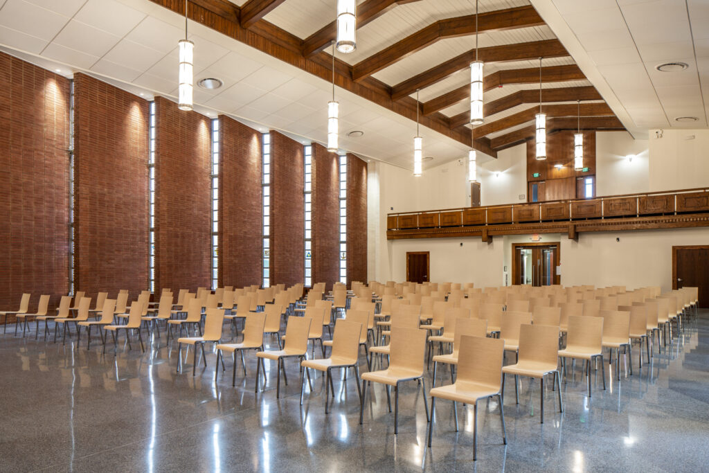 Greg Poole, Jr. All Faiths Chapel Nave Seating and Hanging Lights