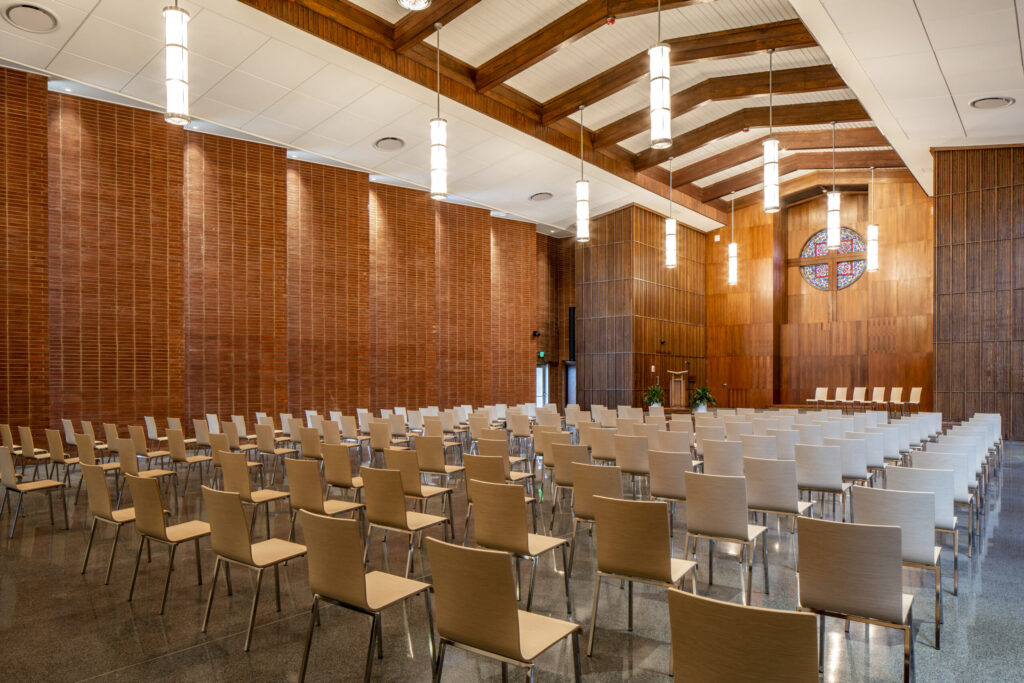 Greg Poole, Jr. All Faiths Chapel Nave Seating, Hanging Lights, and Chancel