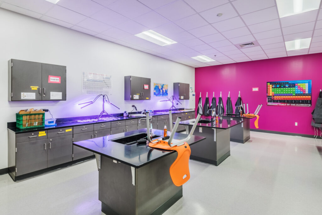Fuquay-Varina High School Lab Classroom with Black Workspaces with Sinks and LED Lights
