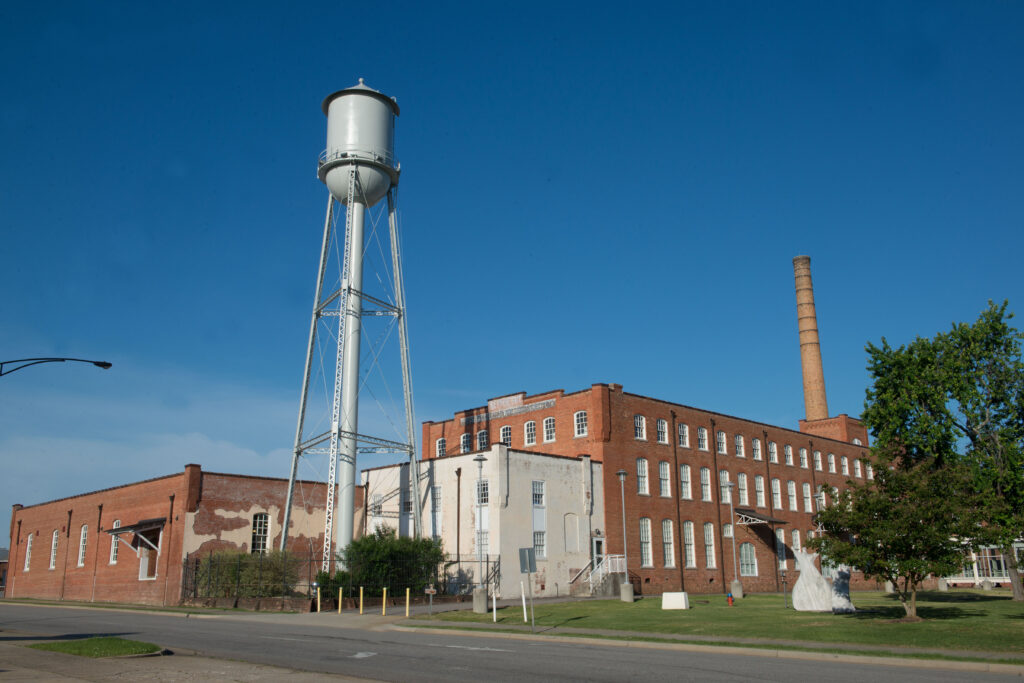 Water Tower and Brick Building