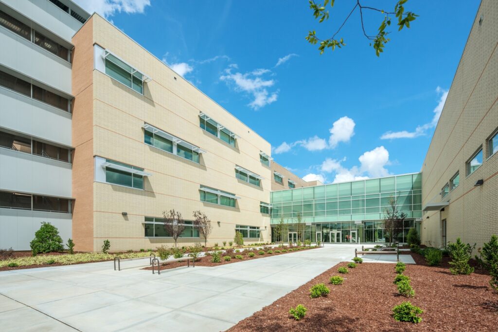 Front Sidewalk and Glass Door Entrance