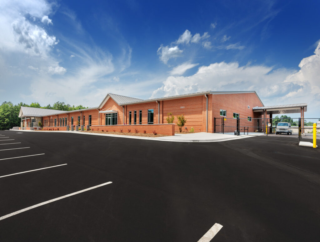 Parking Lot and Brick Building