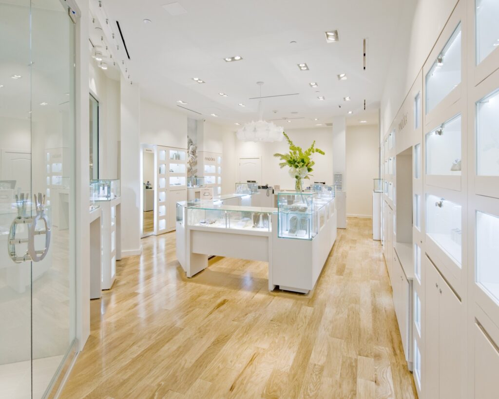 White and Glass Display Cases with Jewelry