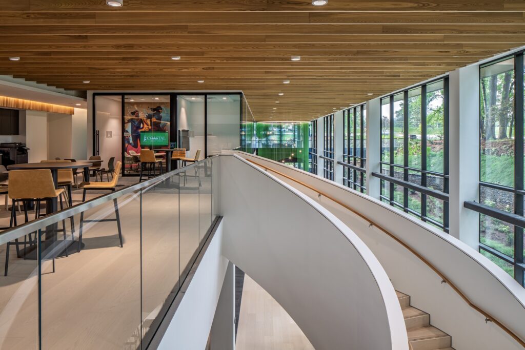 Interior communicating staircase at Coastal Credit Union headquarters.