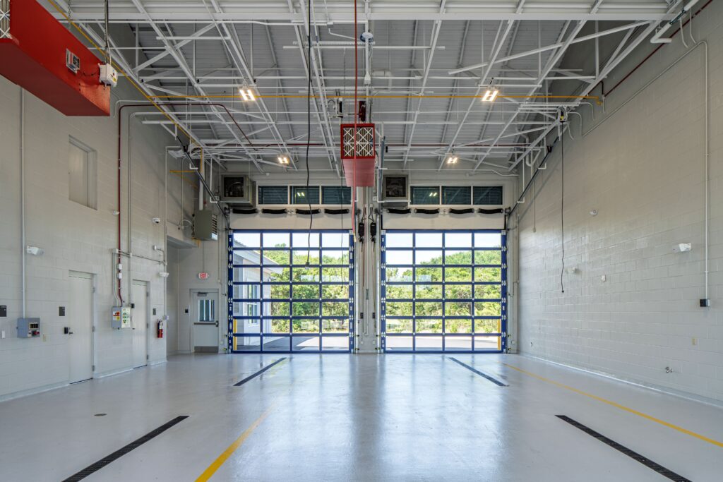 Interior apparatus bay for emergency vehicles.