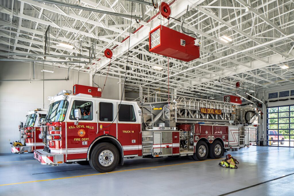 Fire engine inside the apparatus bay at EMS #1 and Kill Devil Hills Fire Station #14.