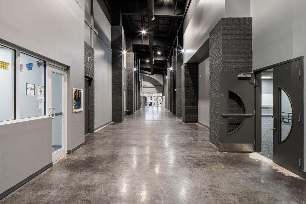 Interior corridor connecting classrooms and activity spaces.